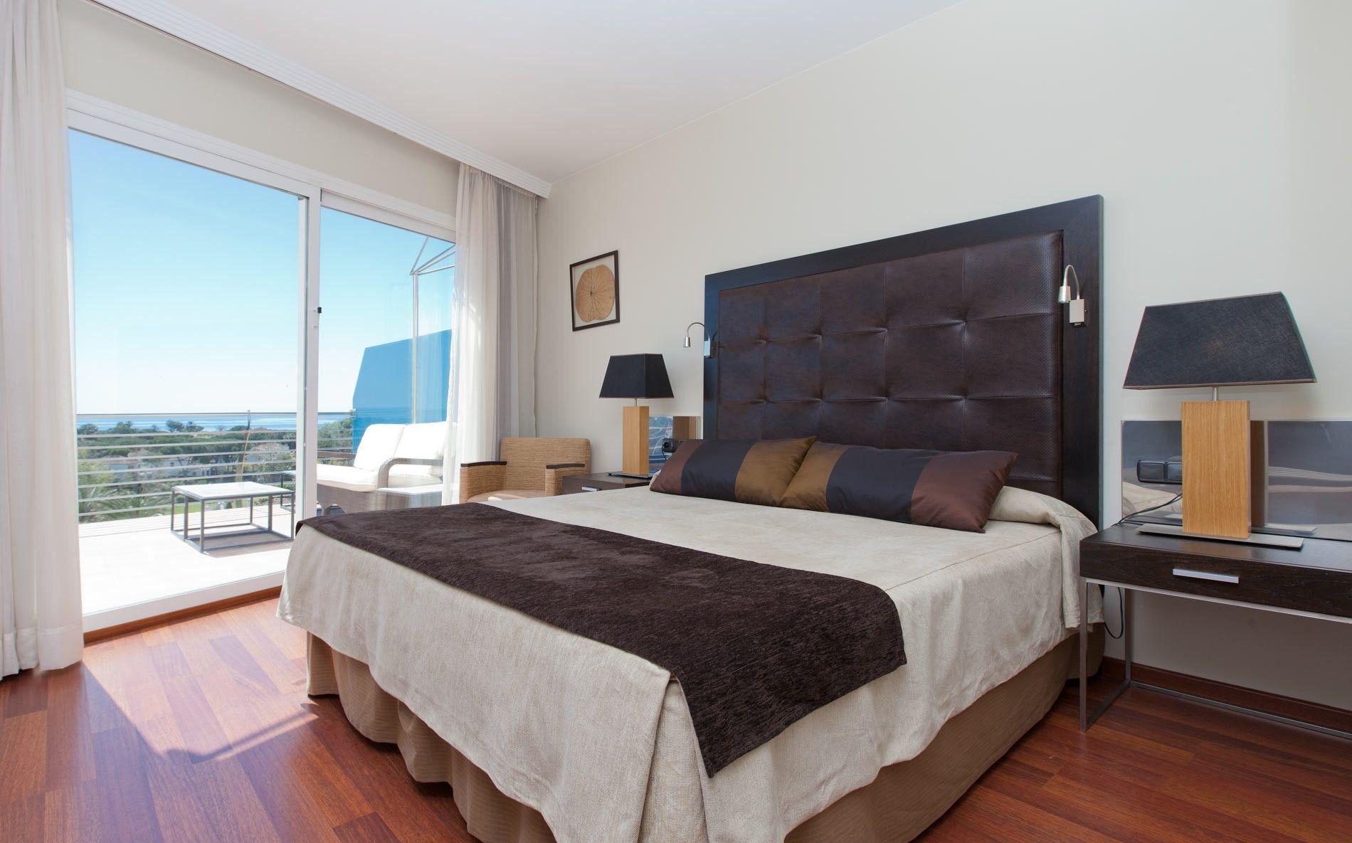 塞纳托尔巴努斯Spa酒店 埃斯特波纳 外观 照片 A bedroom in a hotel