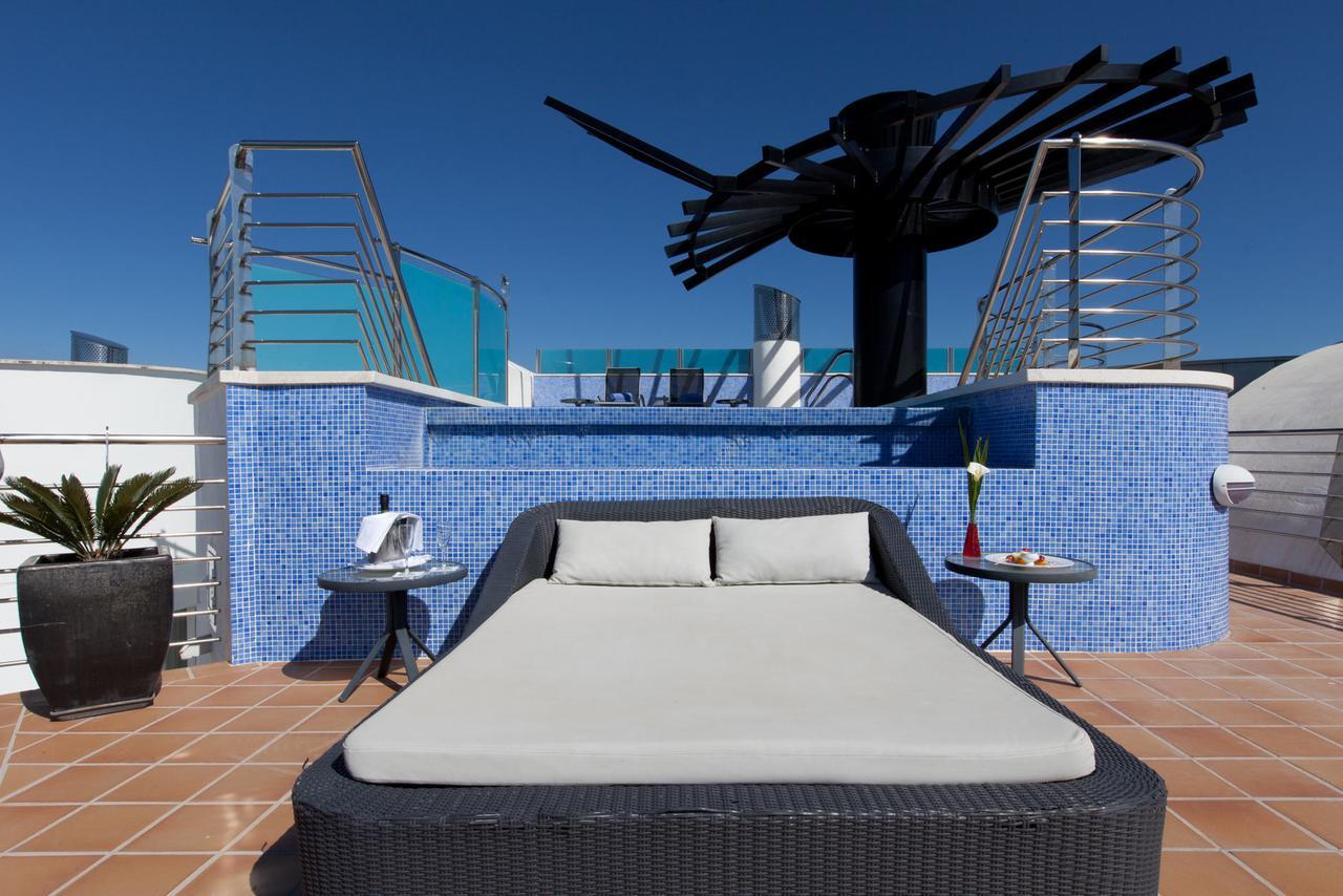 塞纳托尔巴努斯Spa酒店 埃斯特波纳 外观 照片 Rooftop pool